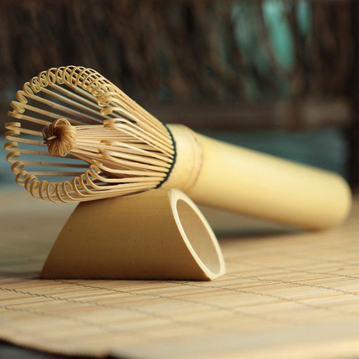 a close up of a tooth brush on a wooden surface