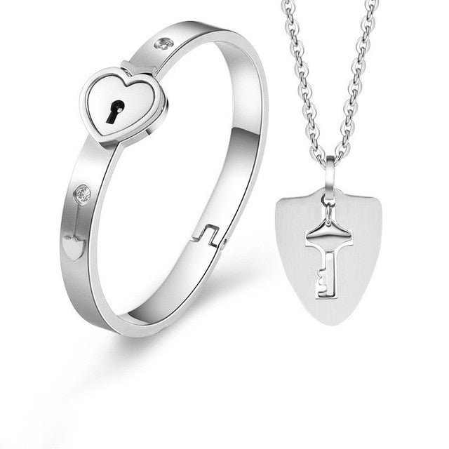 Beautiful Silver Concentric Lock Key Couple Bracelet and Necklace Set On Sale