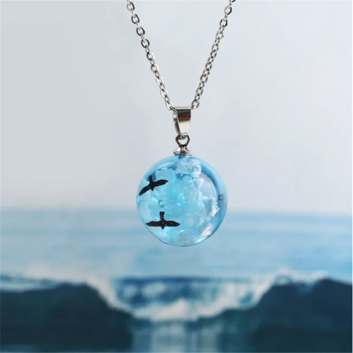 Birds Fly In The Cloudy Sky Luminous Resin Globe Pendant Necklace On Sale