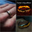 Close-up of decorative Elvish-style lettering on a 6mm stainless steel ring on sale