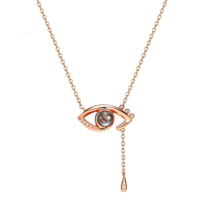 I Love You in 100 Languages Projection Necklace Pendant With Eye Tear Designs In Gold On Sale
