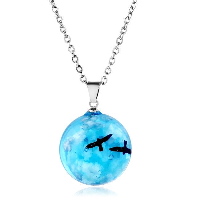 Birds Fly In The Cloudy Sky Luminous Resin Globe Pendant Necklace On Sale